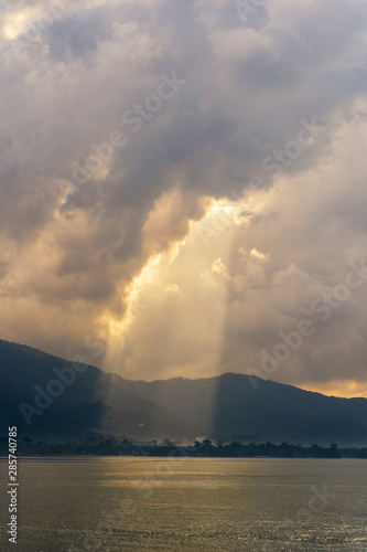 Sunlight through the clouds at dawn, island Koh Samui, Thailand