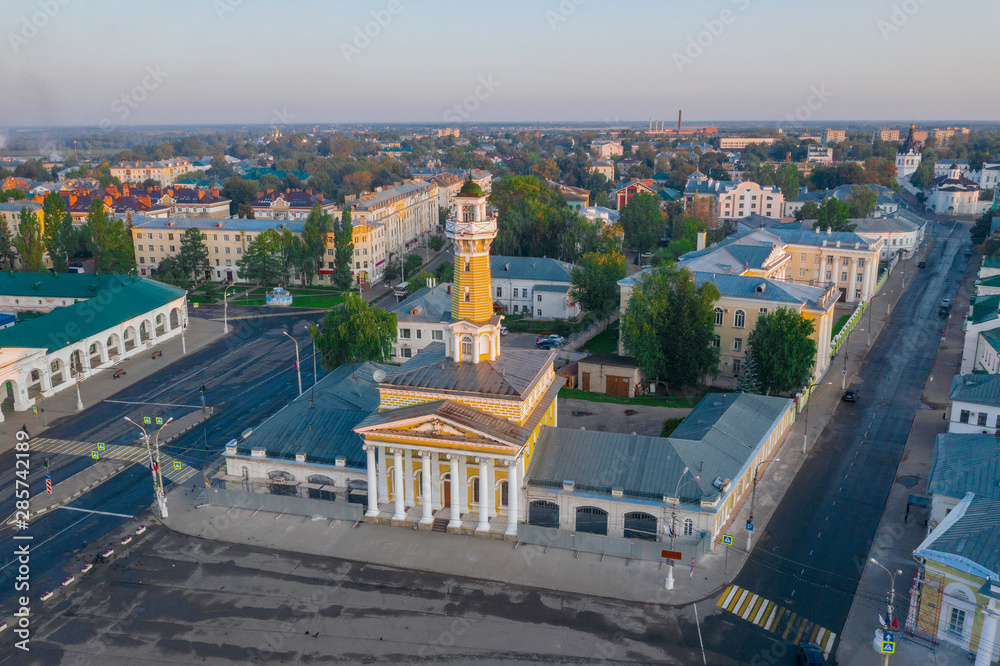 Scenic aerial view of the Fire tower in historical center of ancient town Kostroma in Russian Federation. Beautiful summer look of old building in old part of capital of russian province