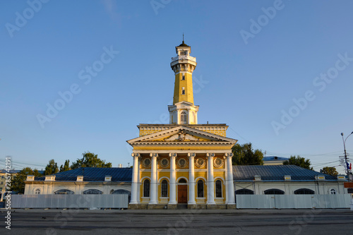 Scenic view of the Fire tower in historical center of ancient town Kostroma in Russian Federation. Beautiful summer look of old building in old part of capital of russian province © Petr Zyuzin