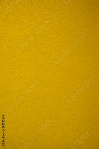 Horizon Yellow color concrete wall background. Concrete wall textured.