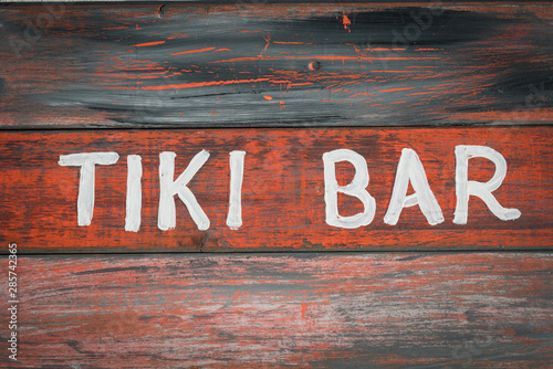 Image of hand painted tiki bar sign photo