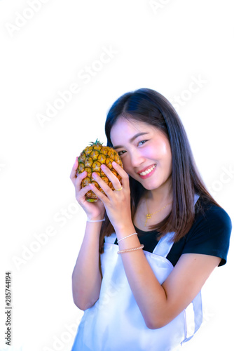 Portrait of Asia girl holding pineapplee