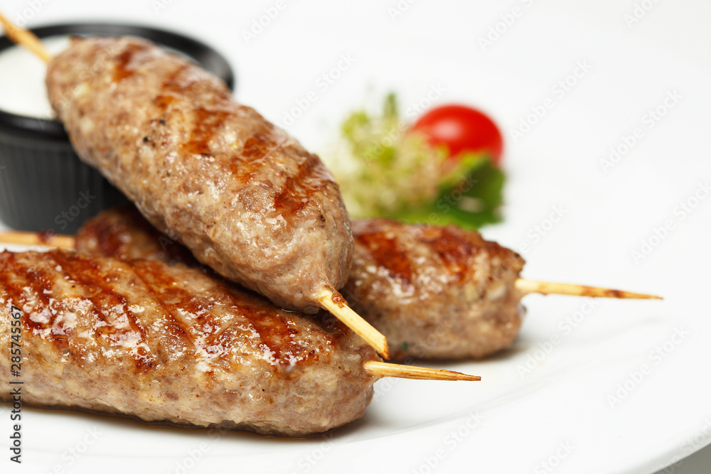 Lula kebab grill with sour cream garlic sauce Lula kebab grill with sour cream garlic sauce