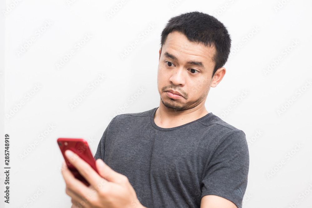 Business asian men intend using smartphone on white background Business asian men intend using smartphone on white background