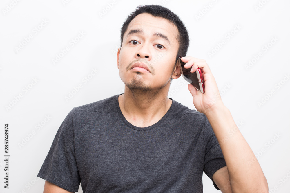 Business asian men intend using smartphone on white background Business asian men intend using smartphone on white background