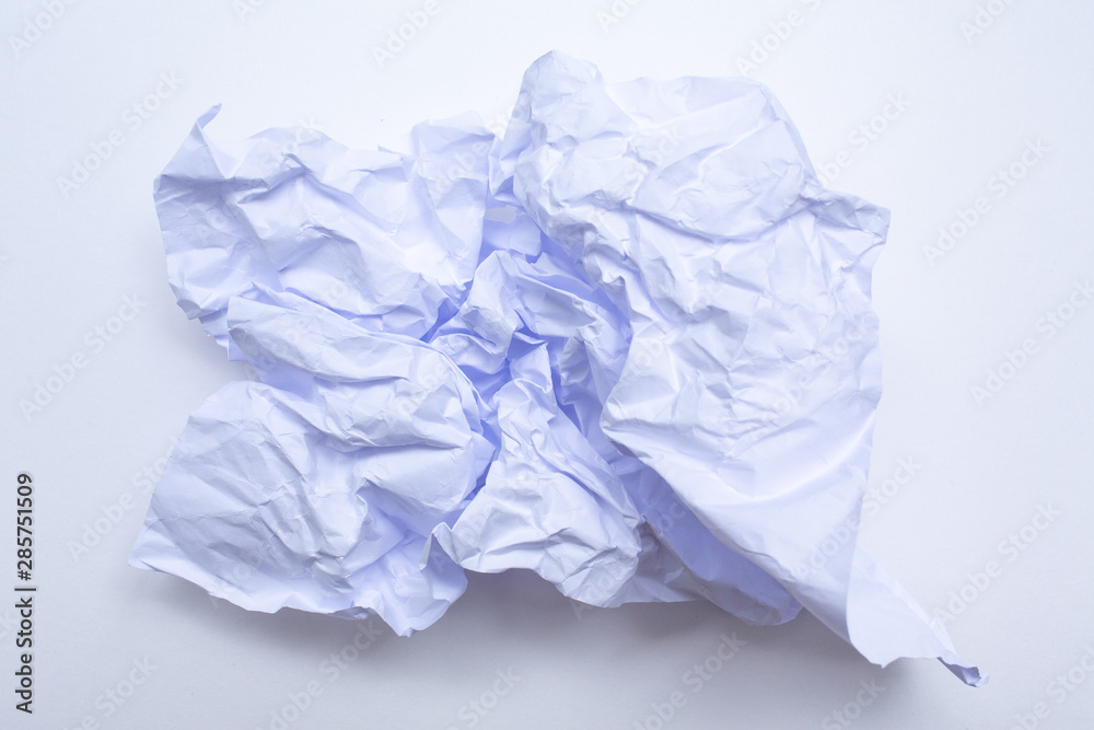 White crumpled paper on white background, Close up shot, Business concept White crumpled paper on white background, Close up shot, Business concept