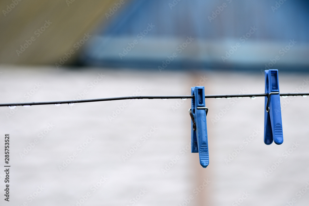 Plastic clotheslines with water drops after rain close up Plastic clotheslines with water drops after rain close up