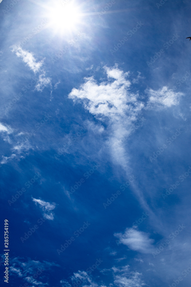 Blue sky background with White fluffy clouds Blue sky background with White fluffy clouds