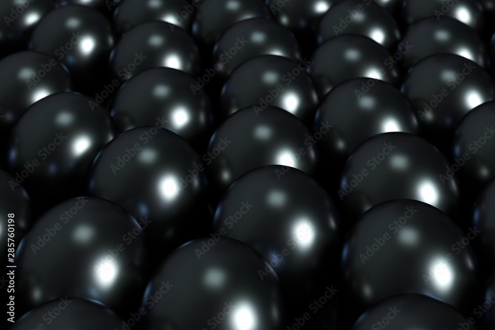 A mass of spheres falling down from above, 3d rendering. A mass of spheres falling down from above, 3d rendering.
