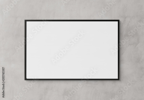 Fotografie Black rectangular horizontal frame hanging on a white wall mockup 3D rendering