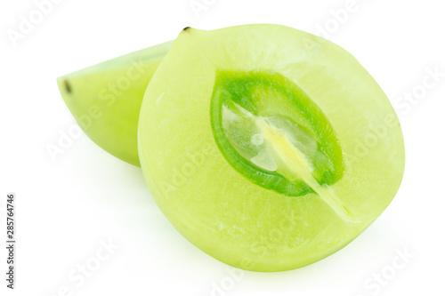 slice Indian gooseberry, amla green fruits isolated on white background. with clipping path. photo