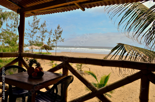 Balcony with table and chairs on the beach in Ayampe, Ecuador photo