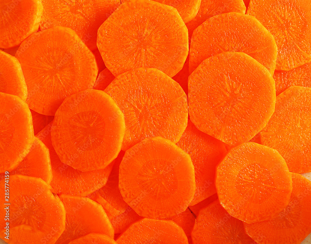 Carrot slices as background texture. Carrot slices as background texture.