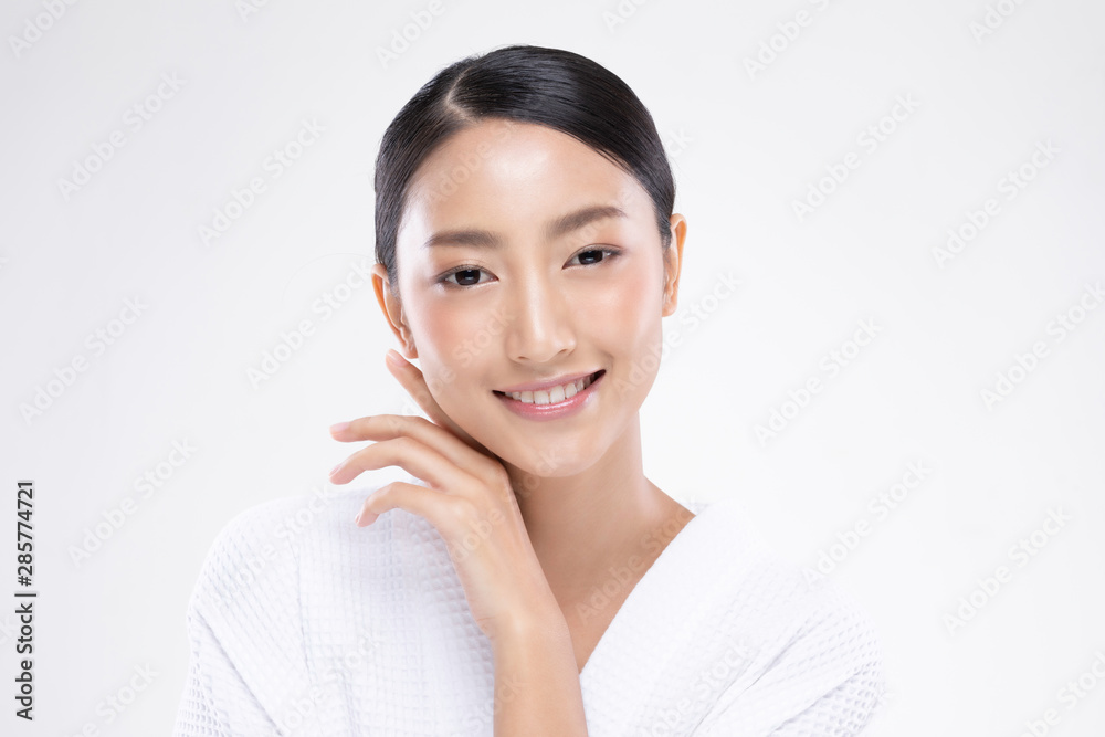 Beautiful Asian woman touching soft cheek smile with clean and fresh skin Happiness and cheerful with positive emotional,isolated on white background,Beauty and Cosmetics Concept Beautiful Asian woman touching soft cheek smile with clean and fresh skin Happiness and cheerful with positive emotional,isolated on white background,Beauty and Cosmetics Concept