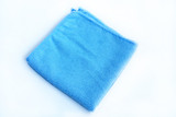  Bright blue towel on a white background.