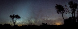 Silhouette of Australian outback panorama in front of milky way and zodiacal light