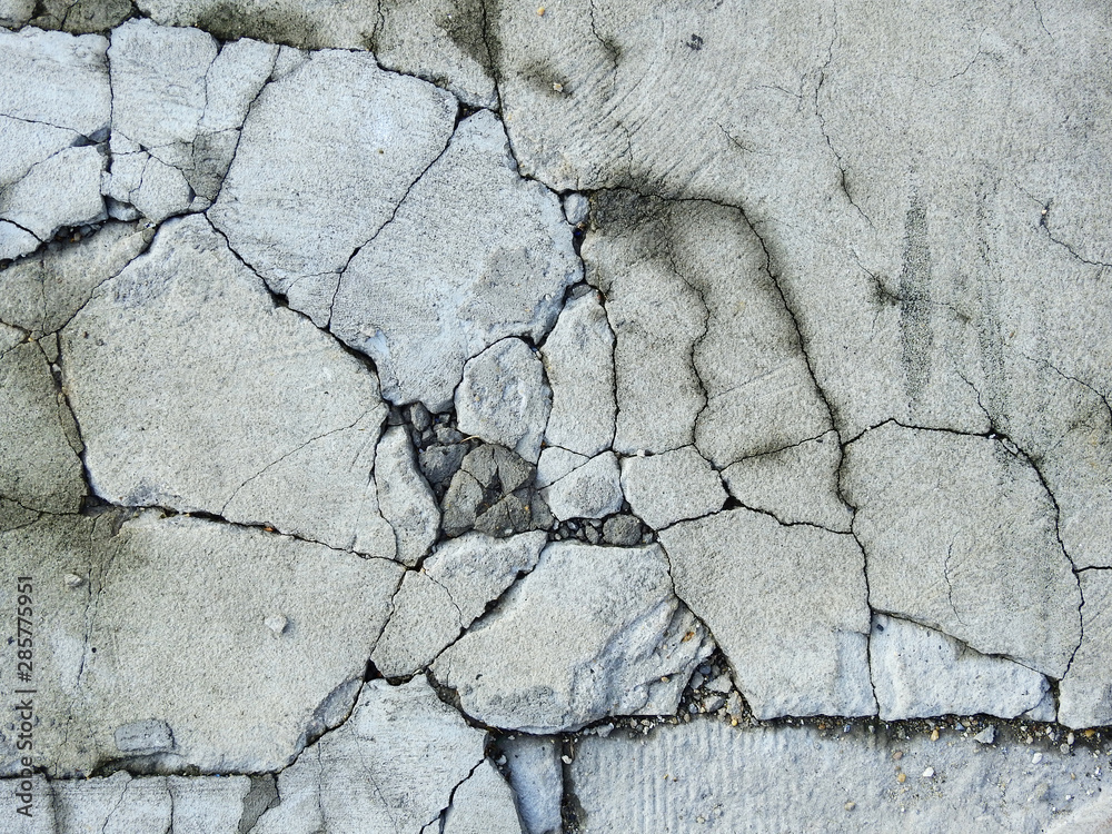 Obraz premium Cracked concrete texture closeup background
