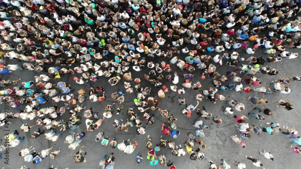 Crowded street. View from the drone of people crowd.