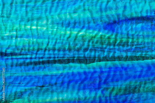 Texture stained glass background blue marine color.