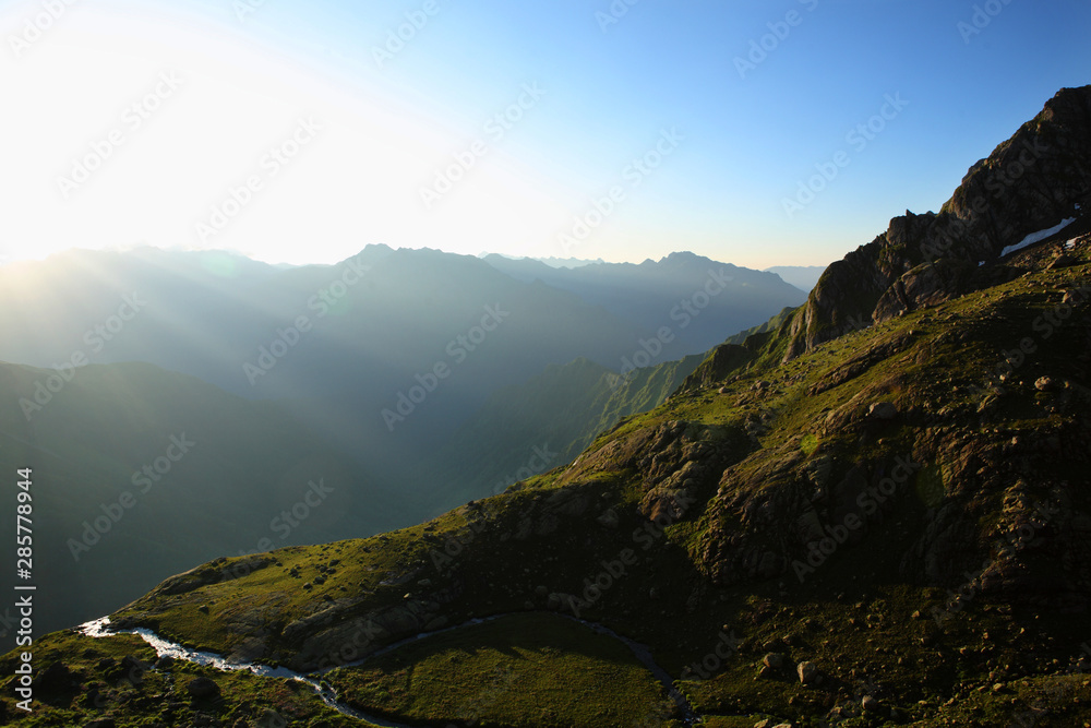 Naklejka Wschód słońca w górach Kaukazu