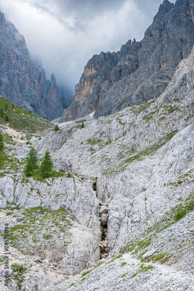Mountain canyon in a wild rocky alp landscape