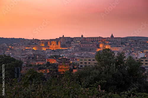 Panoramic view of the Baroque old town of Noto, in the light of sunset, in Sicily Italy. photo
