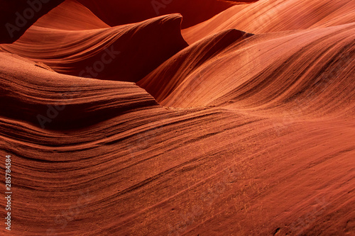 Beautiful formations of sand erosion in the caves of Lower antelope canyon in Page, AZ