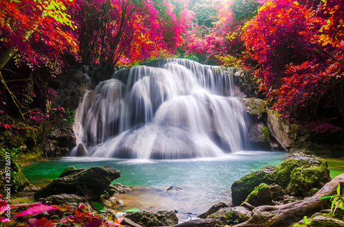 huay mae kamin waterfall in colorful autumn forest at Kanchanaburi © Meawstory15Studio