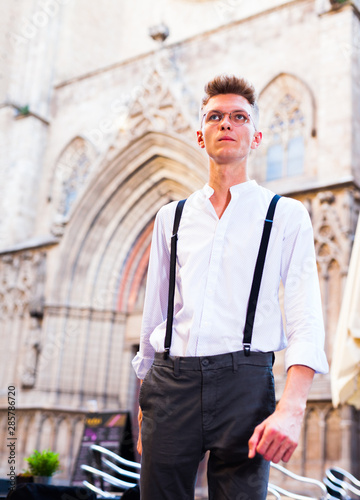 man posing in gothic quarter of Barcelona