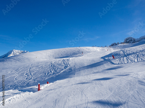 COURCHEVEL, FRANCE - January 2018: Amazing view of snow covered Courchevel slope in French Alps. Ski Resort Courchevel