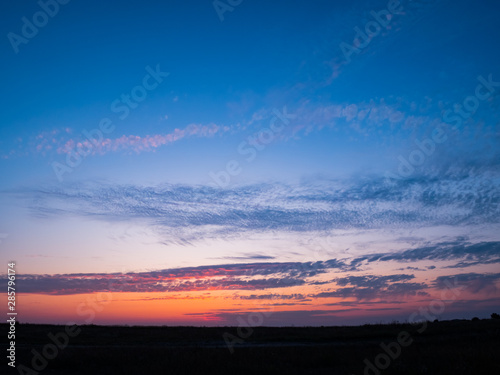 Beautiful Natural Sunset Sunrise Over Field. Landscape Colorful Sky © Vladyslav