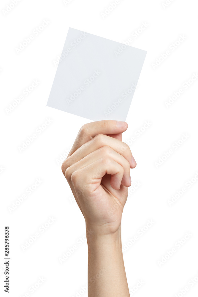 Male hand holding a square blank sheet of paper (ticket, flyer, invitation, coupon, etc.), isolated on white background
