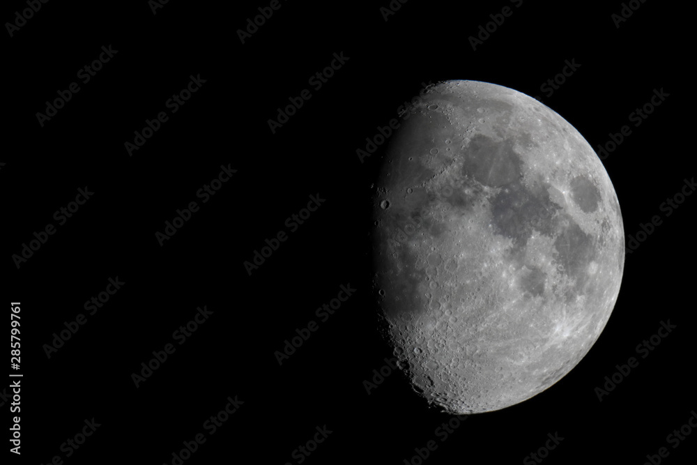 Crescent gibbous moon, with detail of its craters to the left of the ...