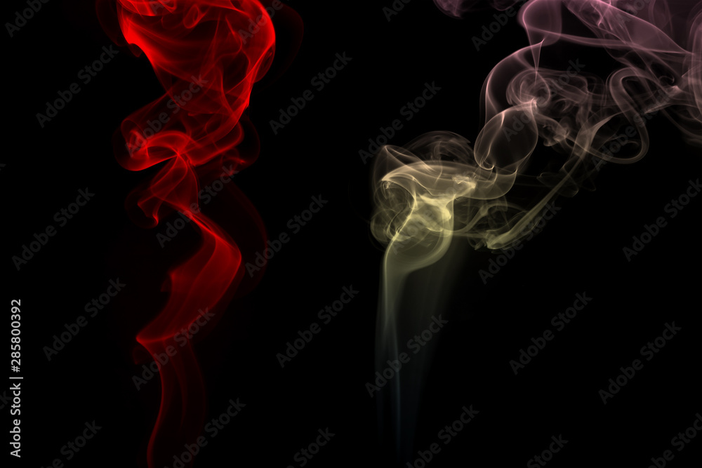 fire of colorful smoke on black background, darkness concept fire of colorful smoke on black background, darkness concept