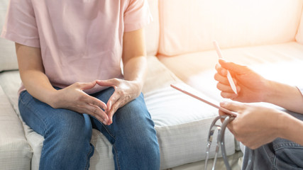 Menopause woman, stressful patient consulting with doctor or psychiatrist who diagnostic examining on obstetric - gynaecological female illness, or mental health in medical clinic or hospital