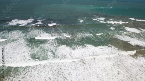 Aerial View breaking waves and Surf, Gemstone Beach, New Zealand