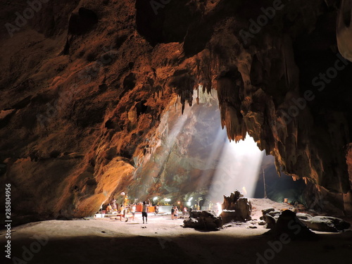 Light shines through the channel Chomphon Cave is  Ratchaburi Thailand