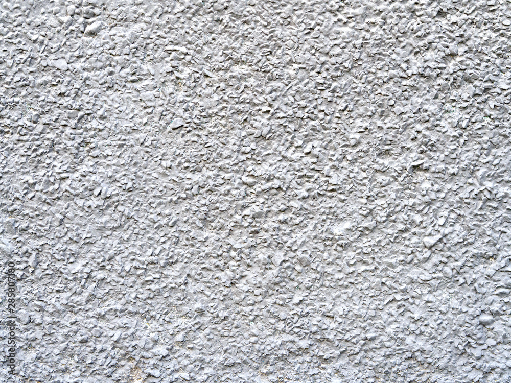 Texture and background of light decorative crushed stone stucco Texture and background of light decorative crushed stone stucco