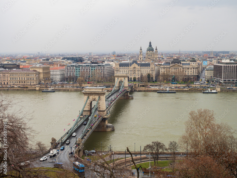 Fototapeta premium The Széchenyi Chain Bridge is a suspension bridge that spans the River Danube between Buda and Pest, the western and eastern sides of Budapest, the capital of Hungary.