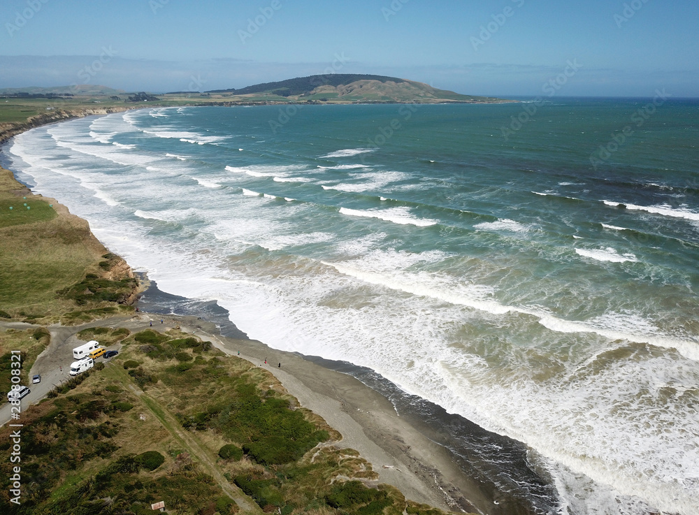 Aerial view breaking waves and surf, Gemstone Beach, New Zealand