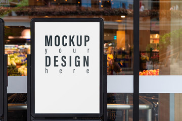 Mockup advertising board in front  of supermarket. Mock up billboard for your text messege or mock up content with department store or shopping mall background.