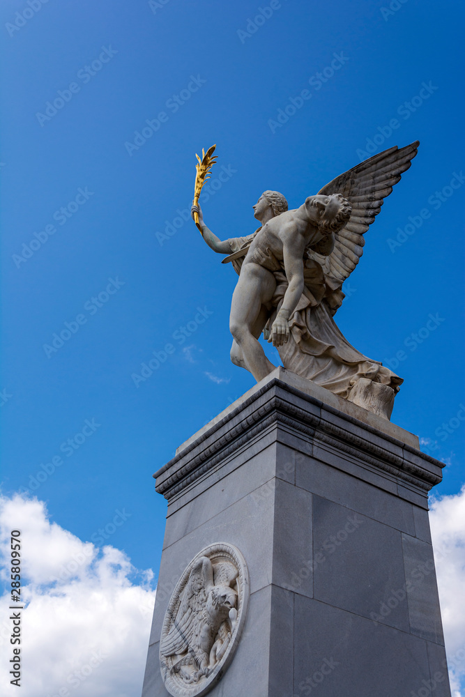 Statue of Greek God Iris carrying fallen hero to Mount Olympus