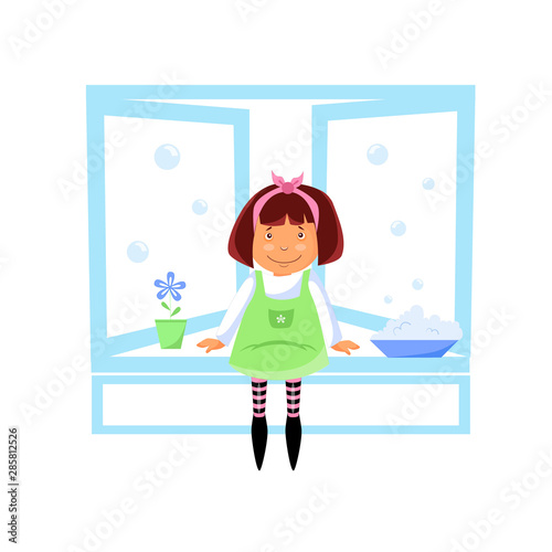 girl cleaning and washing windows