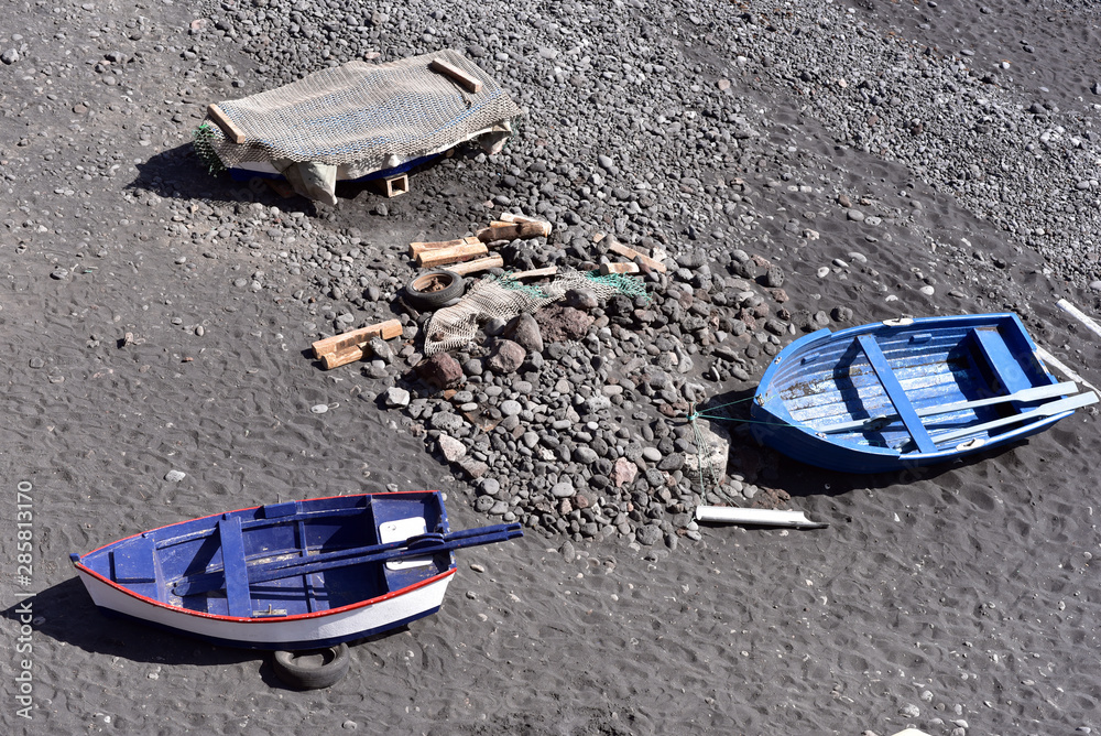 Aerial view of the fishing boats docked on the El Golfo Beach in Lanzarote, Canary Islands, Spain Aerial view of the fishing boats docked on the El Golfo Beach in Lanzarote, Canary Islands, Spain