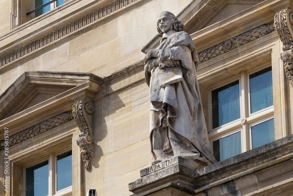 Cardinal Jules Mazarin (1602-1661) statue on the Louvre Palace, Paris, France. He was politician and chief minister to the king Louis XIV. The famous character of the artistic works of Alexandre Dumas