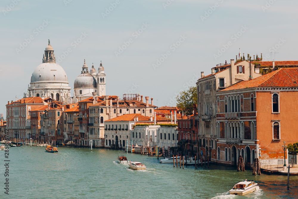 Old cathedral of Santa Maria della Salute and Grand Canal in Venice, Italy