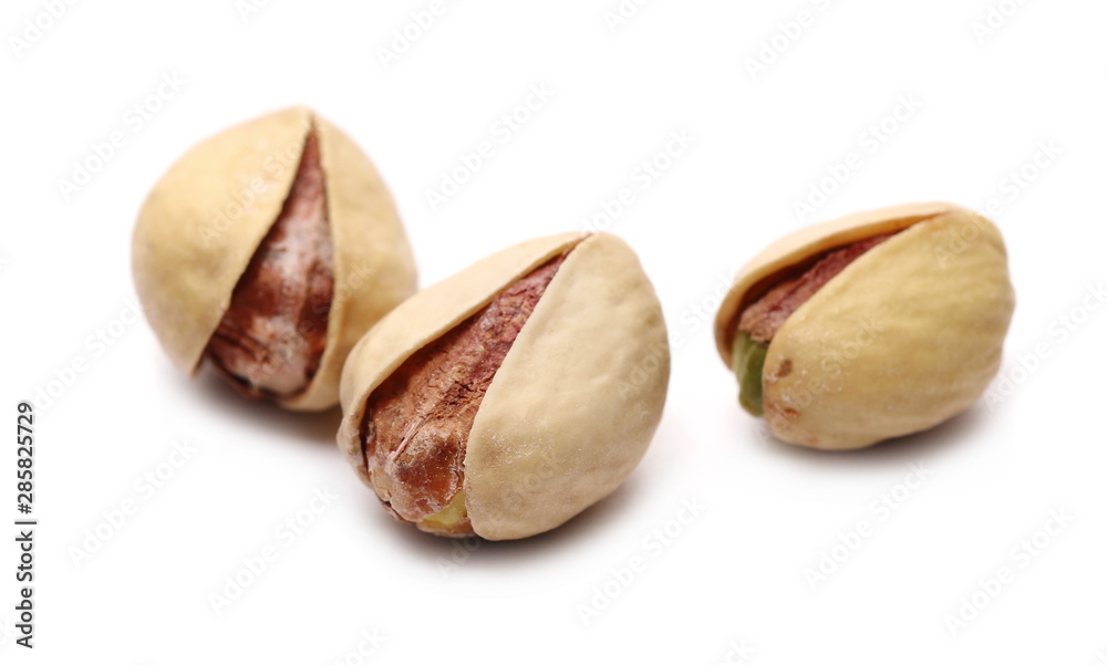 Macro pistachios isolated on white background Macro pistachios isolated on white background