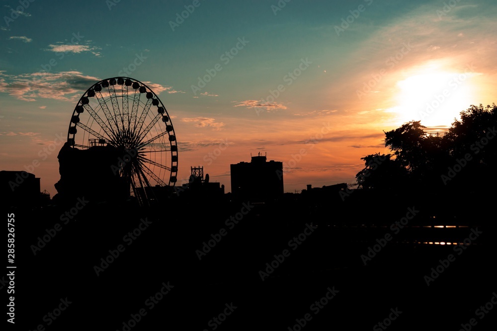 sunset in the city and roller coaster 