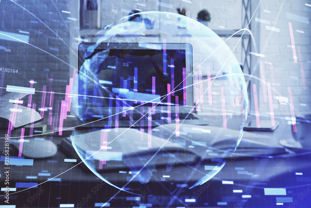 Financial graph colorful drawing and table with computer on background. Multi exposure. Concept of international markets. Financial graph colorful drawing and table with computer on background. Multi exposure. Concept of international markets.