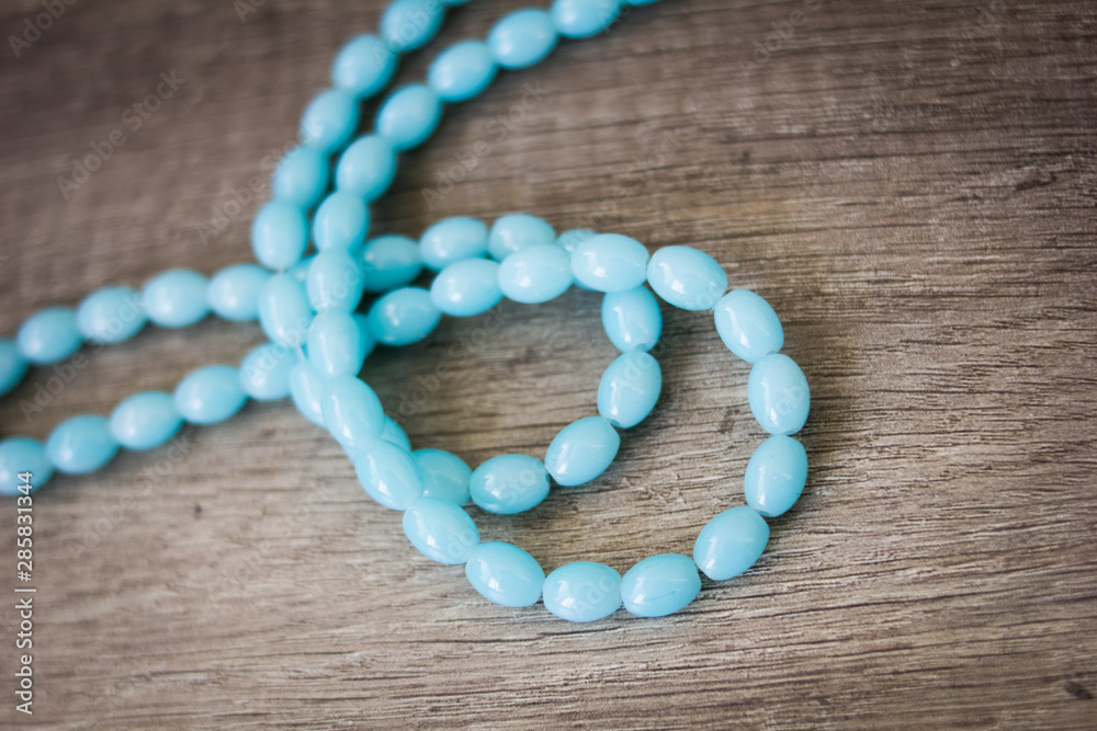 Beautiful blue oval beads photographed with a macro lens Beautiful blue oval beads photographed with a macro lens